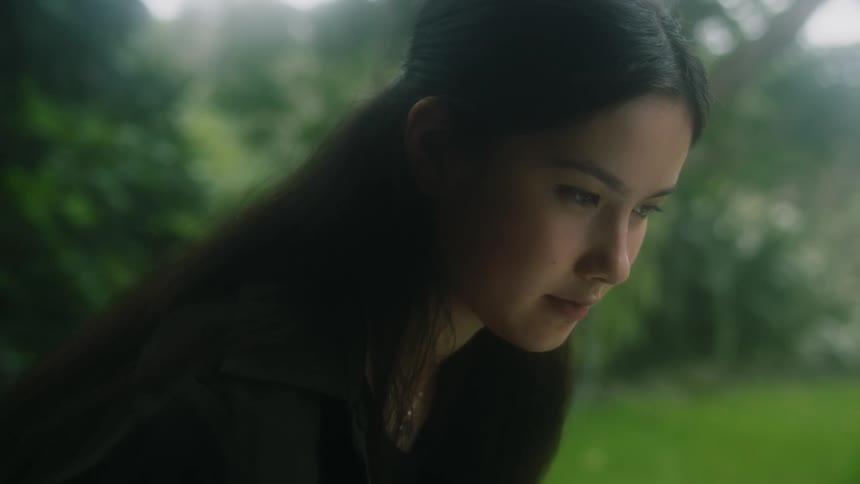 The view is of a portrait of a young teenager