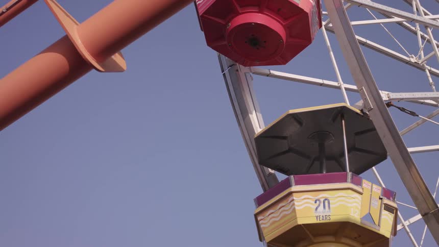 An amusement park ride turns