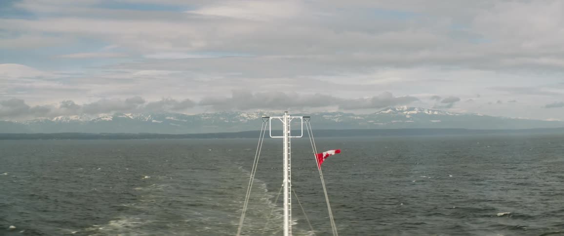 An aerial view of an ocean is displayed