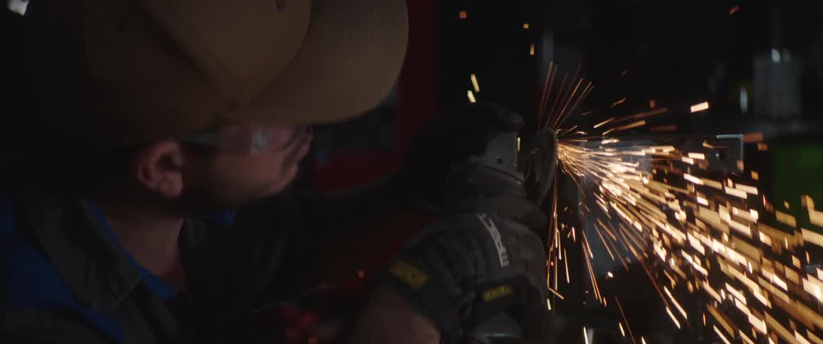 A man using a grinder