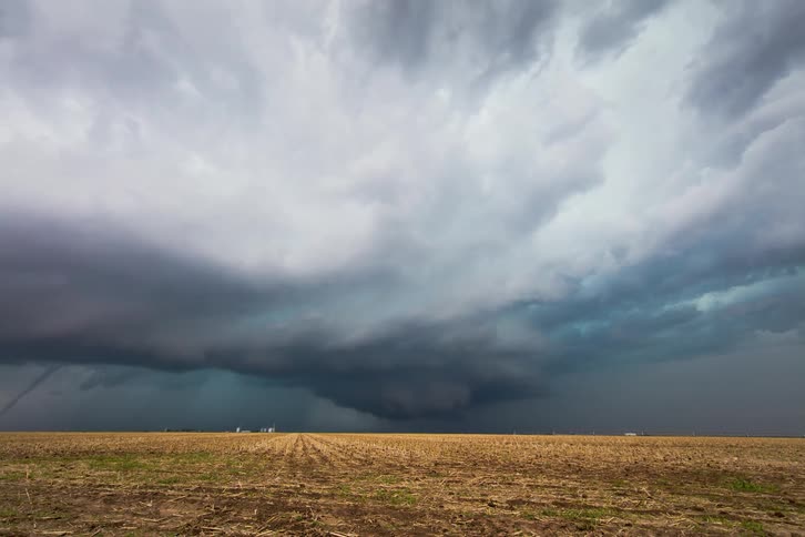 Time lapse of a tornado forming on a large field