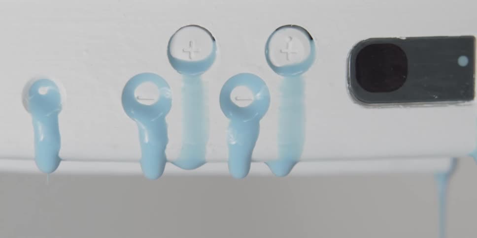 Small holes are oozing a blue liquid