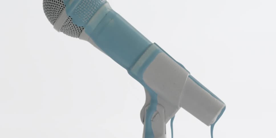 Paint drips down a microphone stand