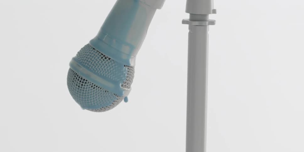 The blue paint drips from the microphone