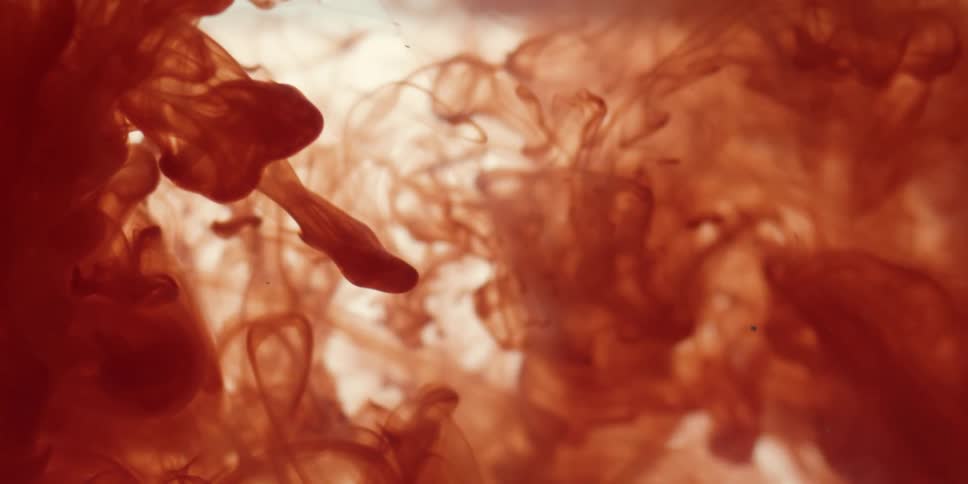 Red fluid swirls and flows