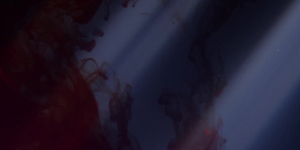 Red liquid swirls and flows