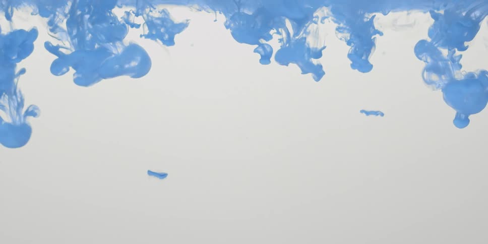 The blue paint is mixing in the white water