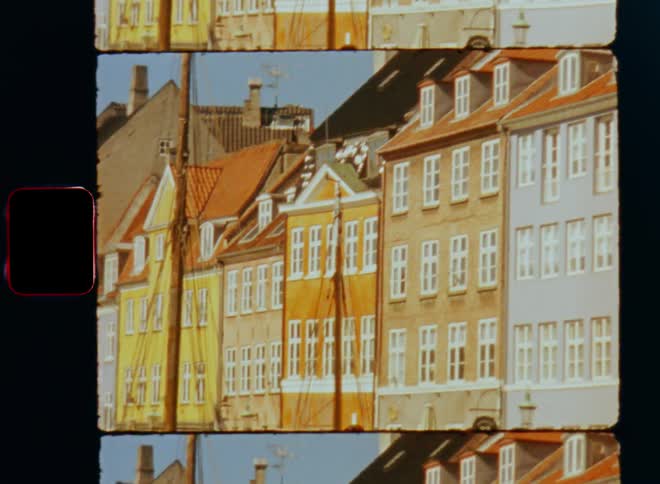 A row of apartment buildings have many windows