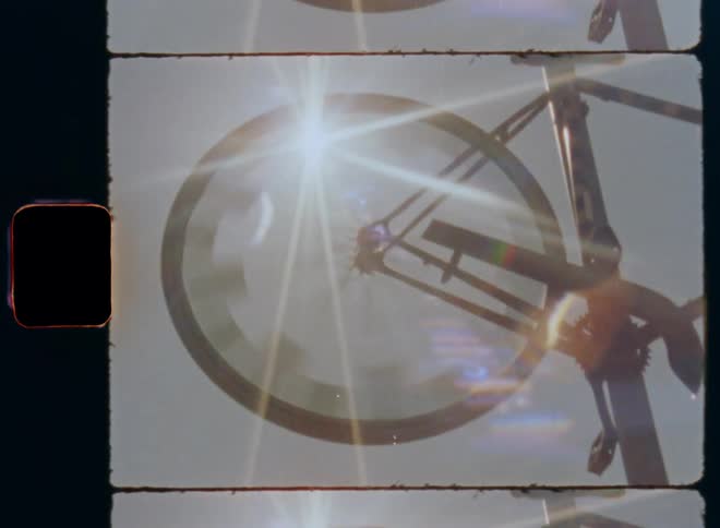 The bicycle wheel is spinning