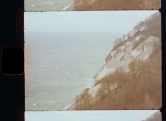 A mountain is on the shore