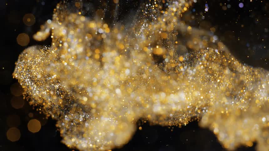 orange glitter cloud falls down and spreads