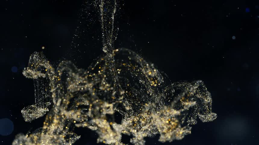 The sparkling smoke falls down in this abstract macro scenery