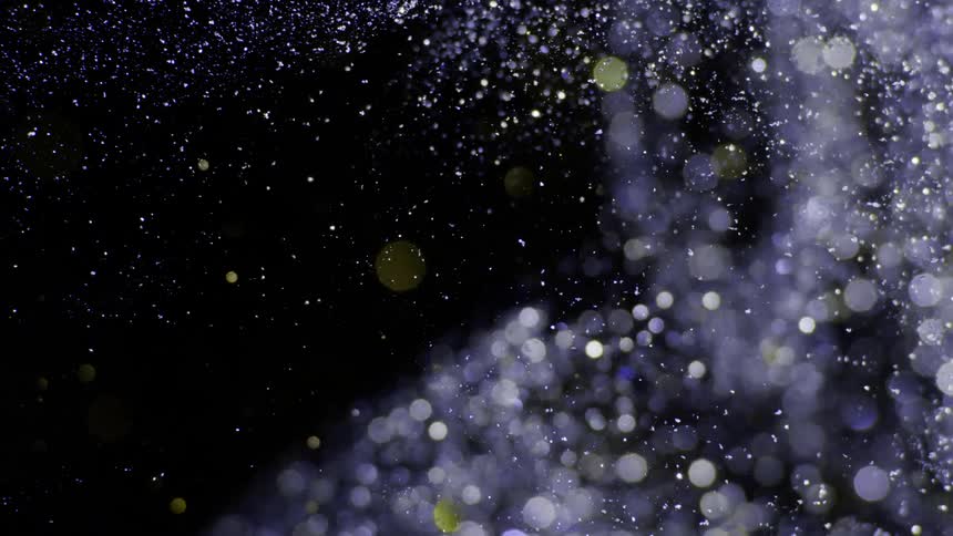 a cloud of liquid glitter sparkles like swarowsky crystals