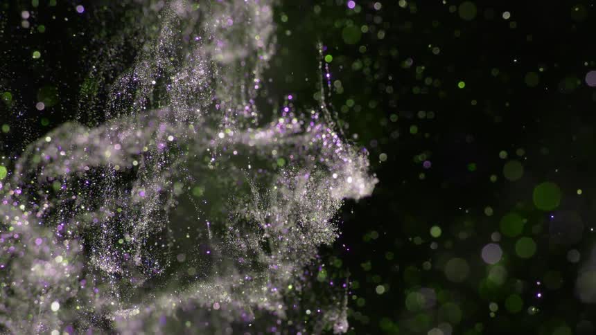 green purple and white glitter cloud shines and reflects light