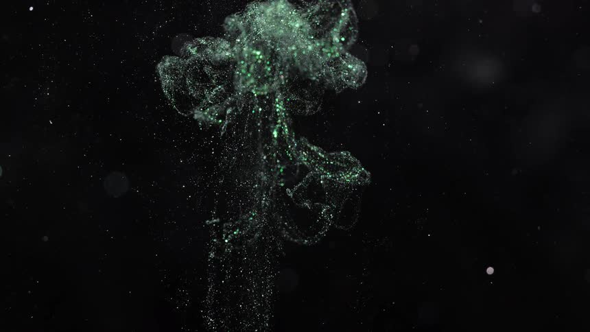 The  green sparkling cloud rises and reflects light