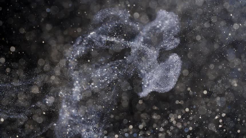A smoke particle flows in the air