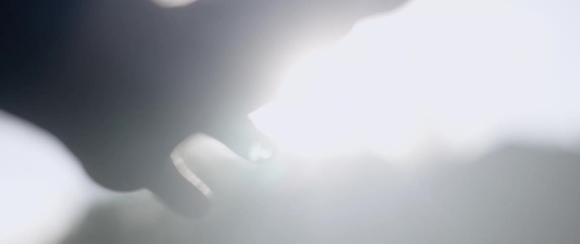 Bright sun shines on a person's hand