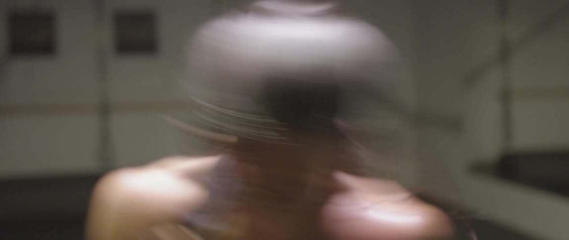 A woman is shadow boxing