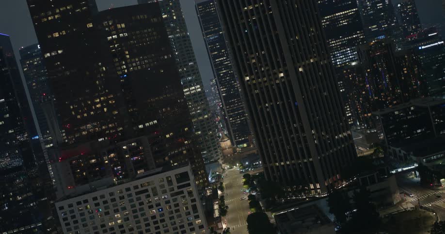 The buildings are lit up at night