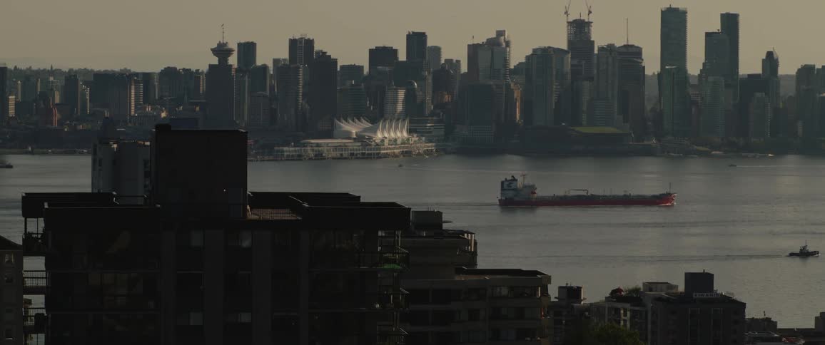 The sun is rising on the city