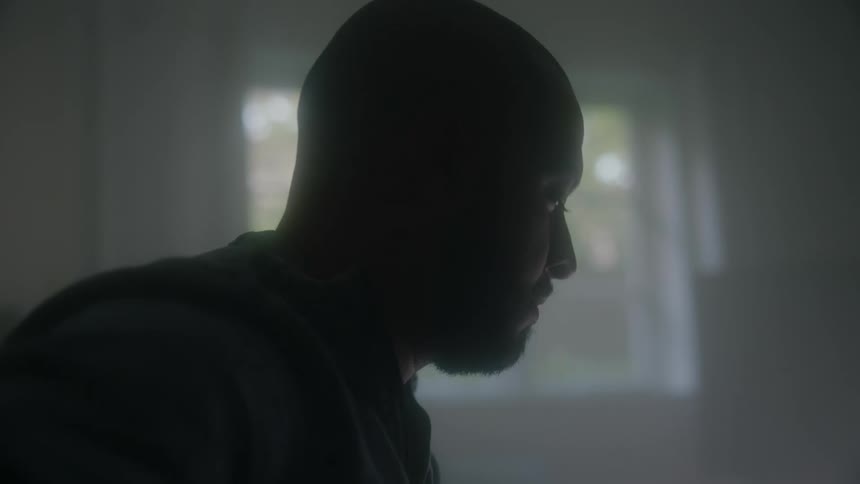 Portrait of a man sitting near a window