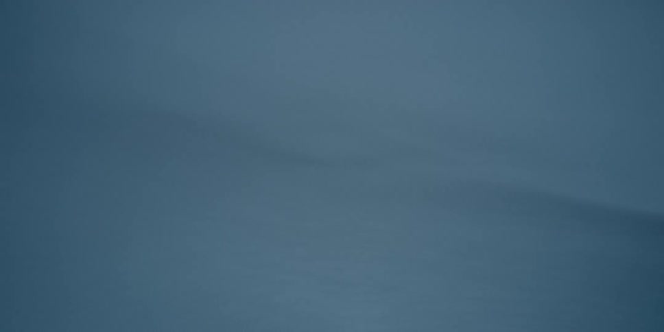 A view of sheets moving around in a room