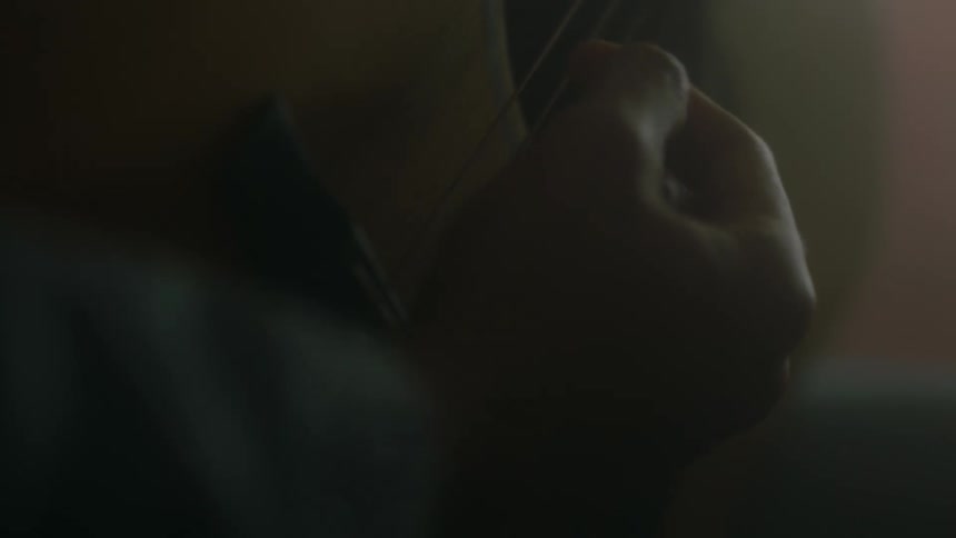 Person playing a musical instrument