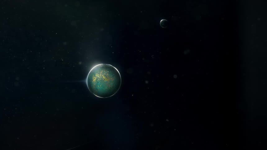Light shines on a sparkling globe as it rotates and moves across the darkness with stars in the distance