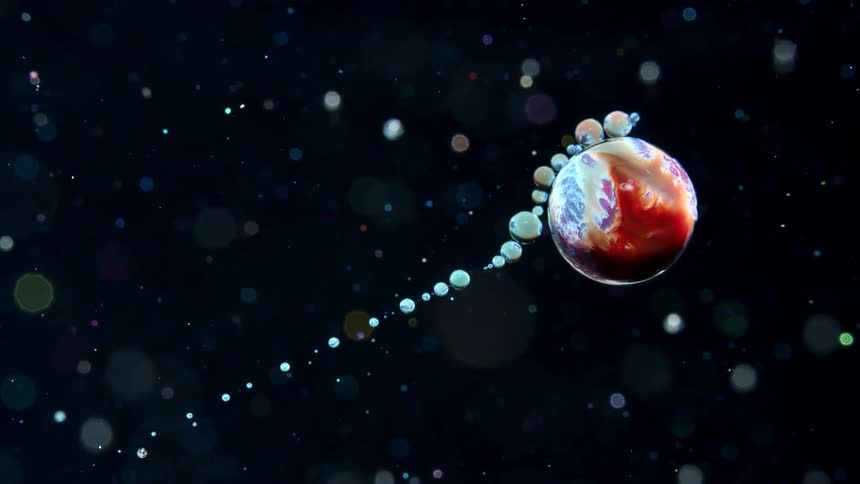 A large sphere moves diagonally down screen and causes a line of smaller molecules to join together