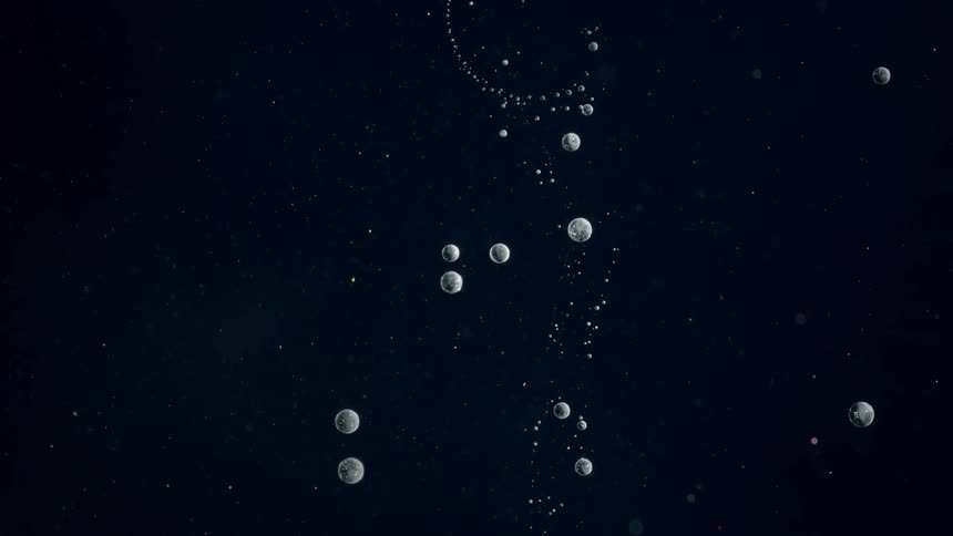 Zoom into a tiny galaxy in outer space  with a parallax effect