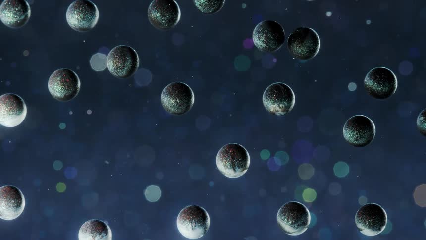 A formation of black and white planets rise against spotted blue background like in open space