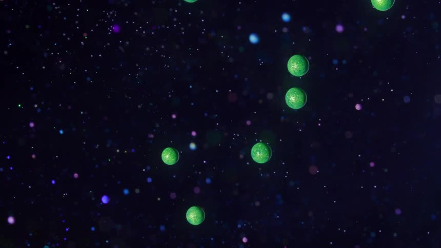 Green and blue spheres orbiting around in outer space