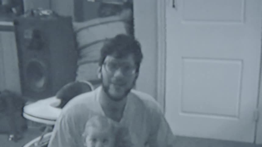 Father and baby are hanging out indoors