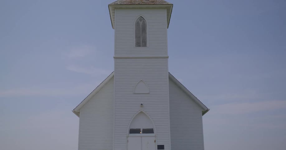 Exterior view of church building in the grassland