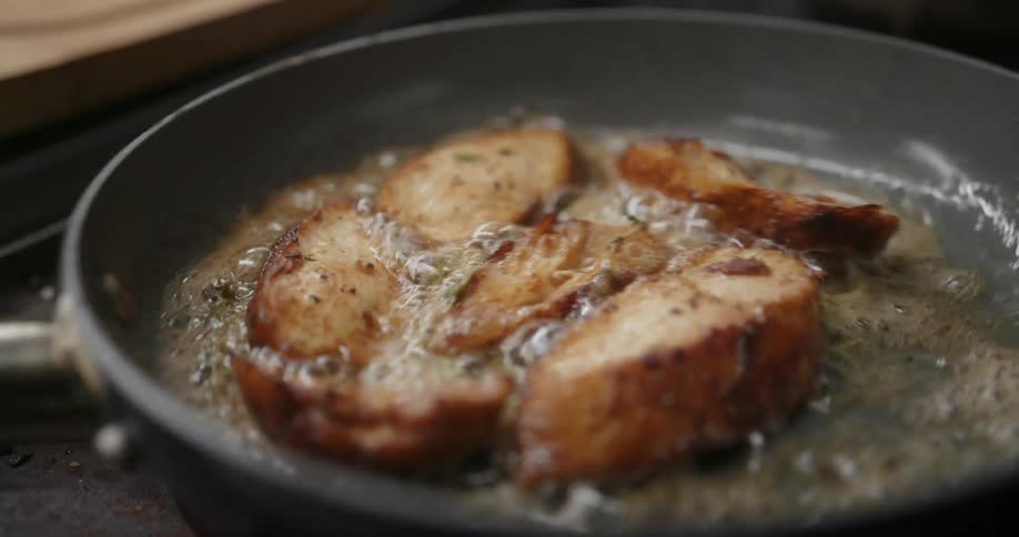 Close up view of chicken being grilled
