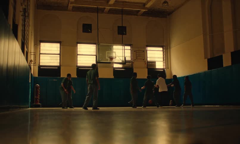 Teenagers are playing basketball