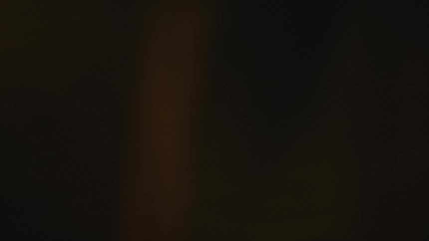A train passes at night