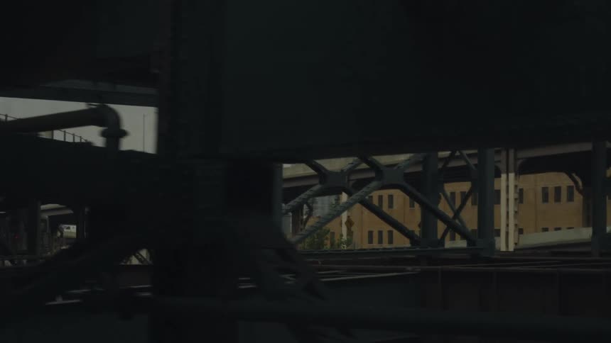Bridge structure built through a citywith buildings around it