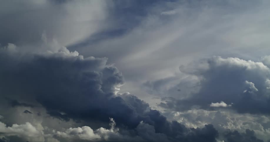 Cumulus clouds are forming into a storm