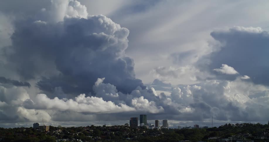 A wide view of the city skyline on a cloudy day