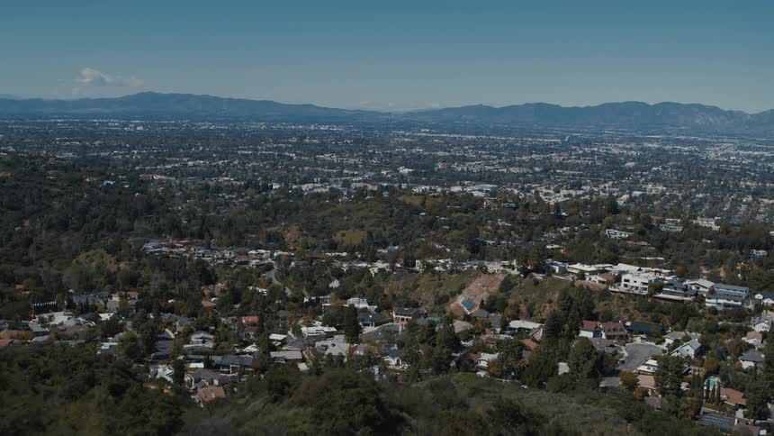 Aerial view of a suburban city during the summer season