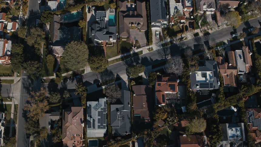 Overhead aerial of intersecting streets in a residential neighborhood in San Fernando Valley Los Angeles