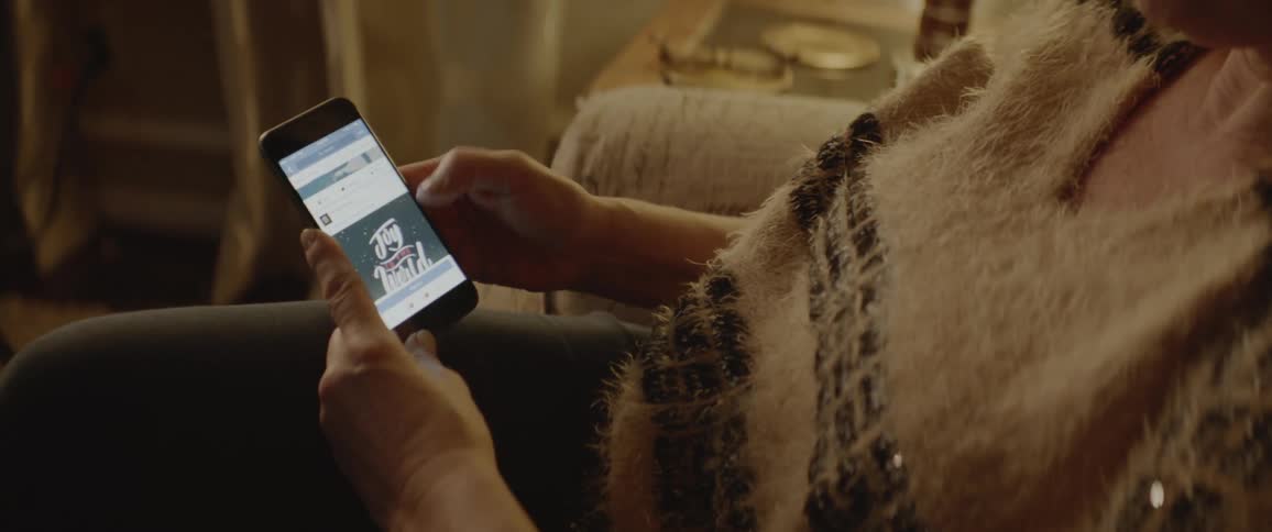 A person is looking at social media on a phone