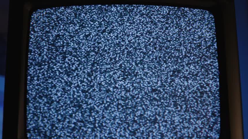 A television playing without a picture showing on the screen