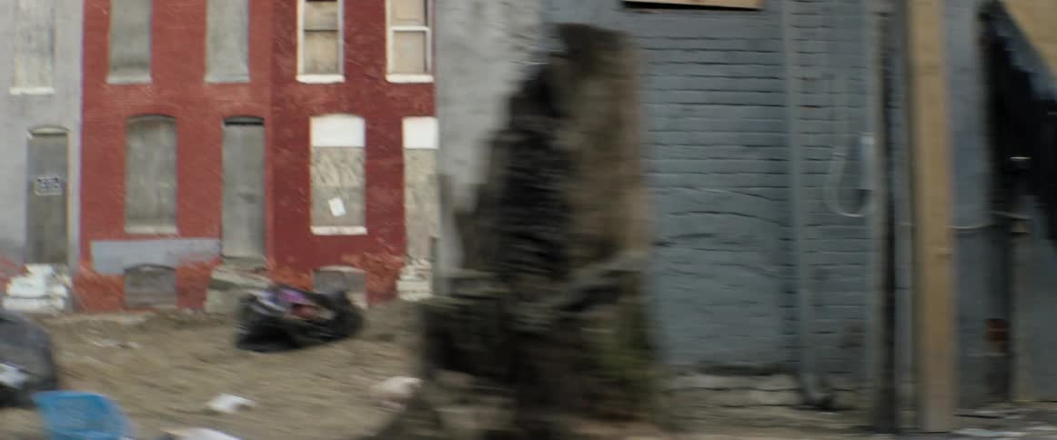 A person is riding their bike down the street