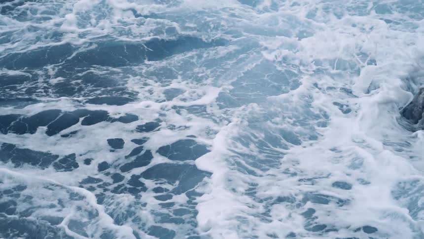 Waves crashing in the ocean