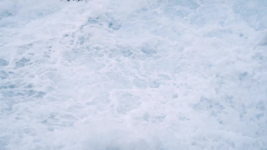 Close up view of ocean waves moving quick