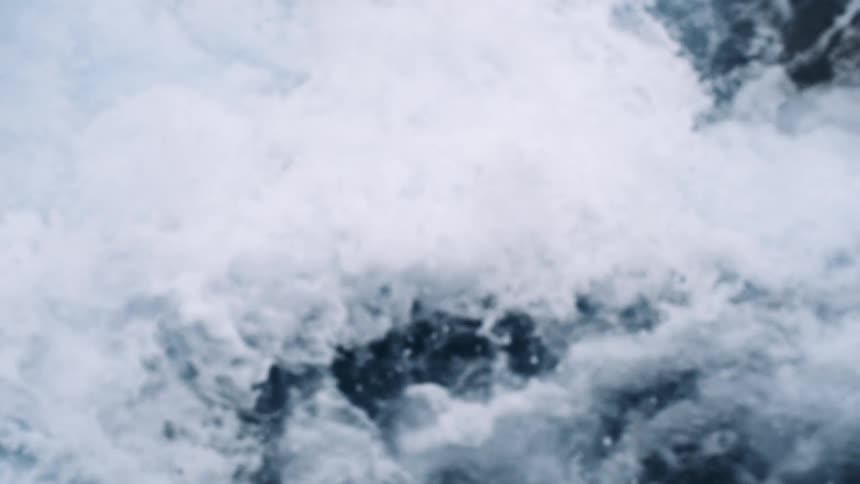 Strong ocean waves are crashing into each other