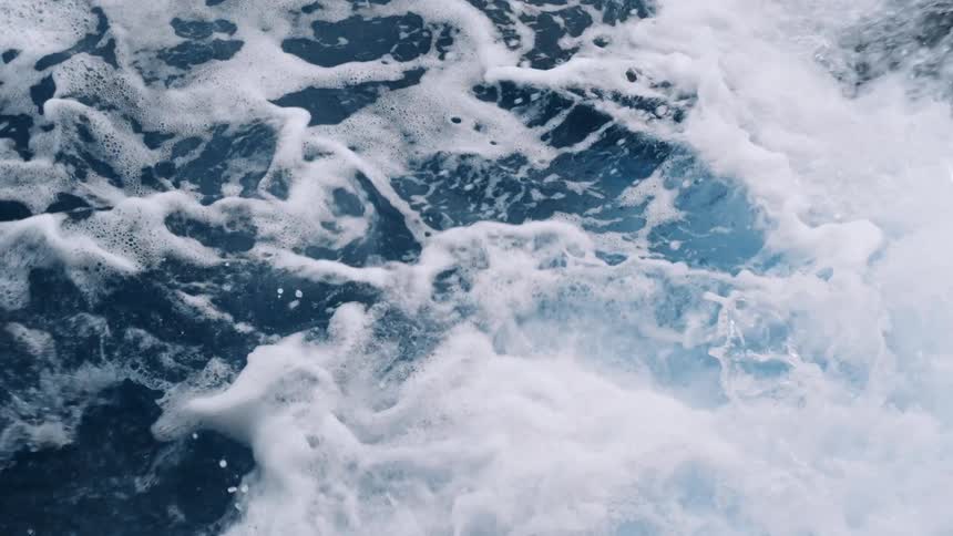 Close up view of ocean waves during midday