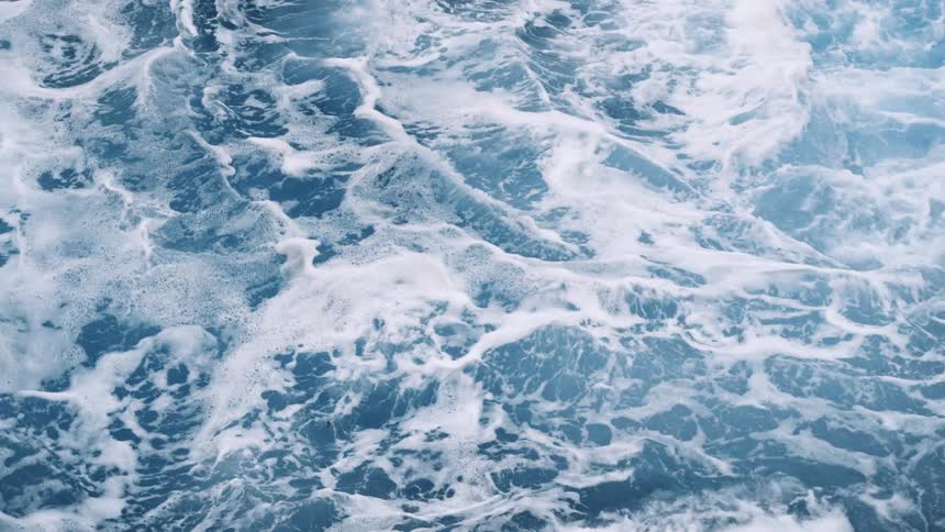 A view of ocean waves moving fast is displayed
